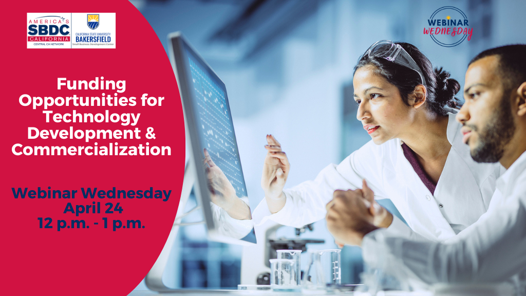 A female and male colleague, approximately 30+ years old, are working on technology and looking at results together on a computer screen.